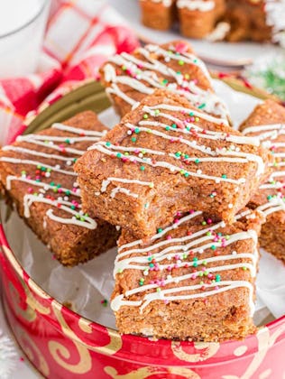 gingerbread blondies in a christmas tin, in a story about cheap christmas baking recipes.