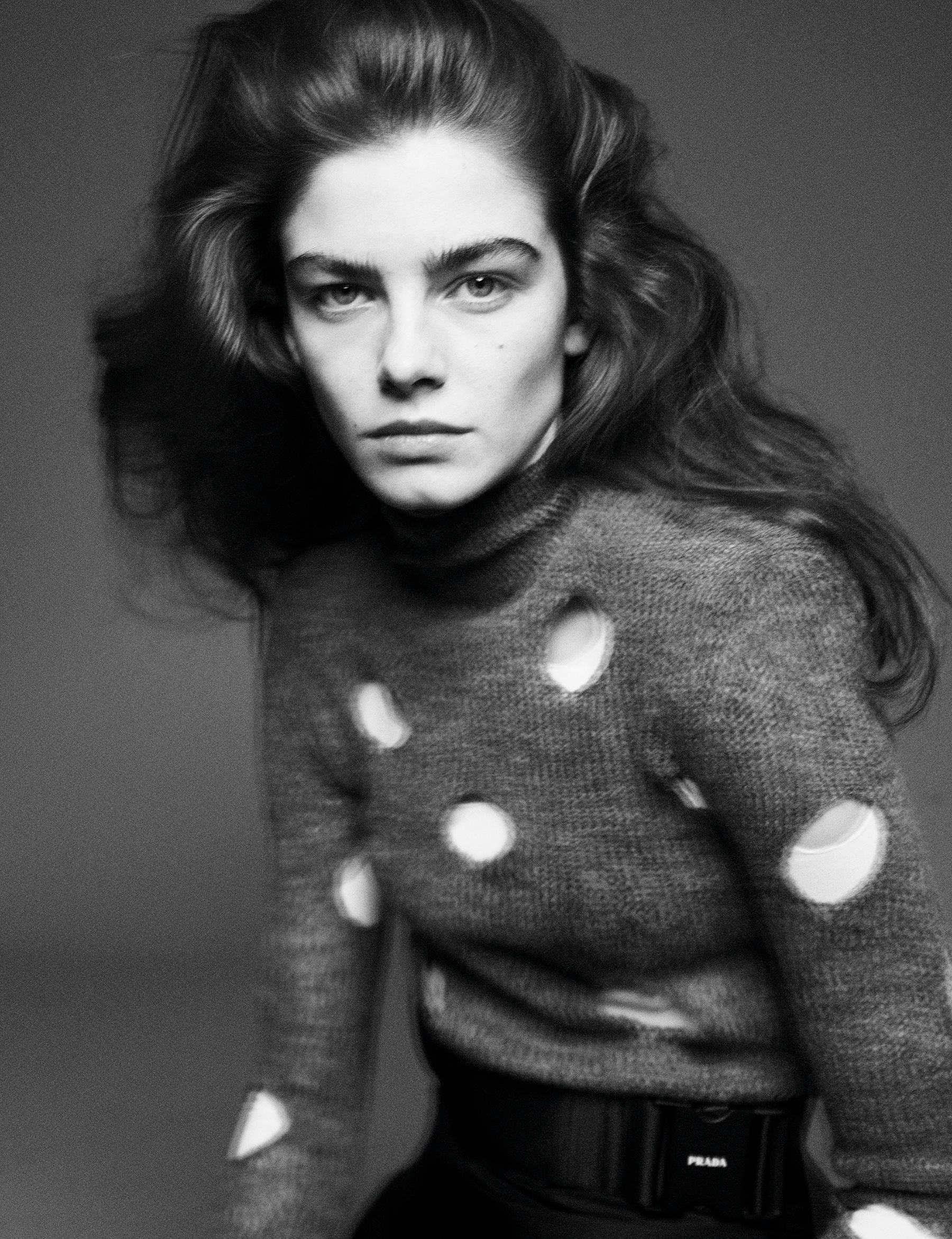 A model wearing a sweater