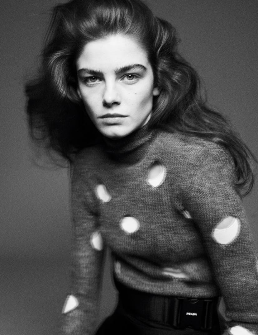 A model wearing a sweater