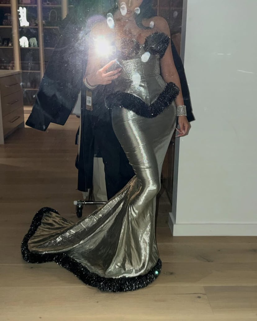 Kendall and Kylie Jenner and Kim Kardashian's Christmas 2025 outfits included plunging, designer dre...