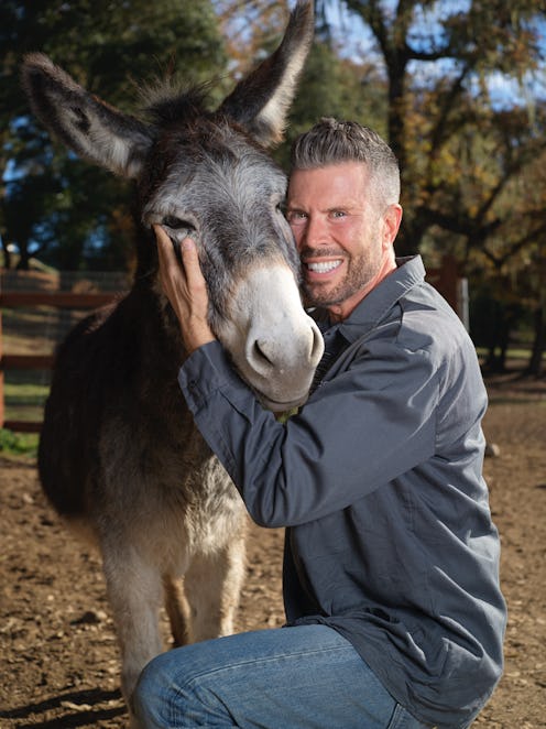 'Donkey King' star Ron King poses with a donkey at Oscar's Place.