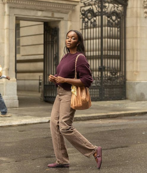 Coco Bassey in a burgundy sweater