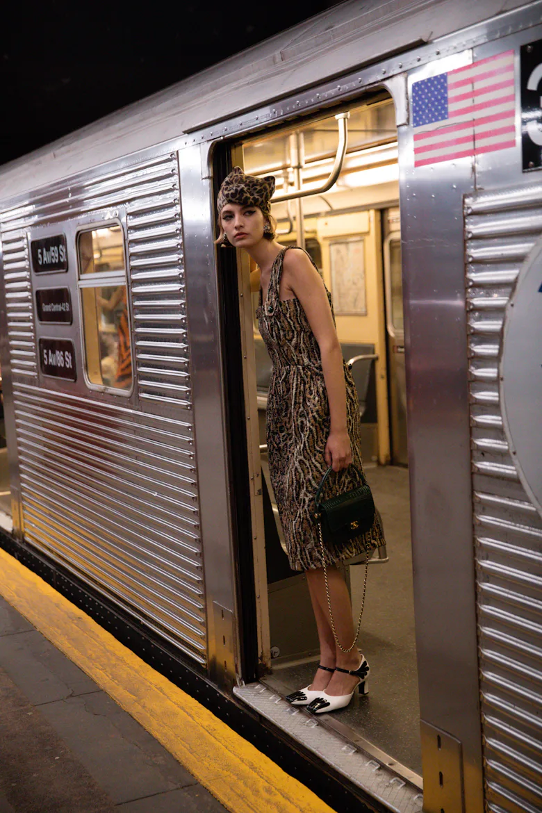 a look from chanel's metiers d'art show in new york city in a subway station