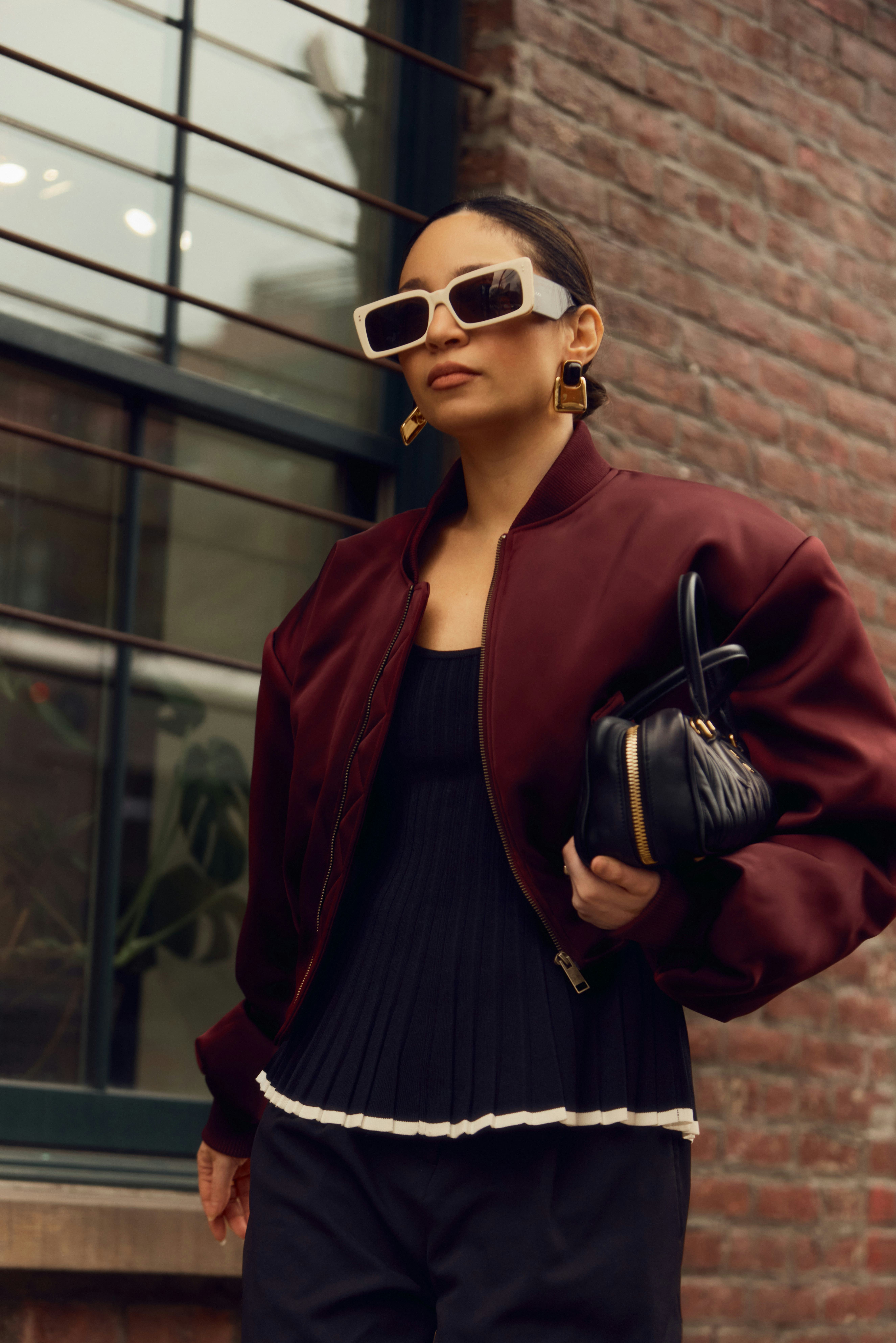 The writer wearing cheugy peplums.