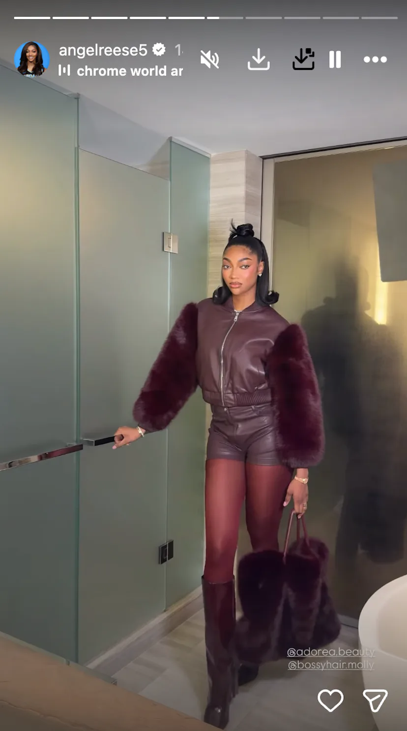 Angel Reese in an oxblood outfit.