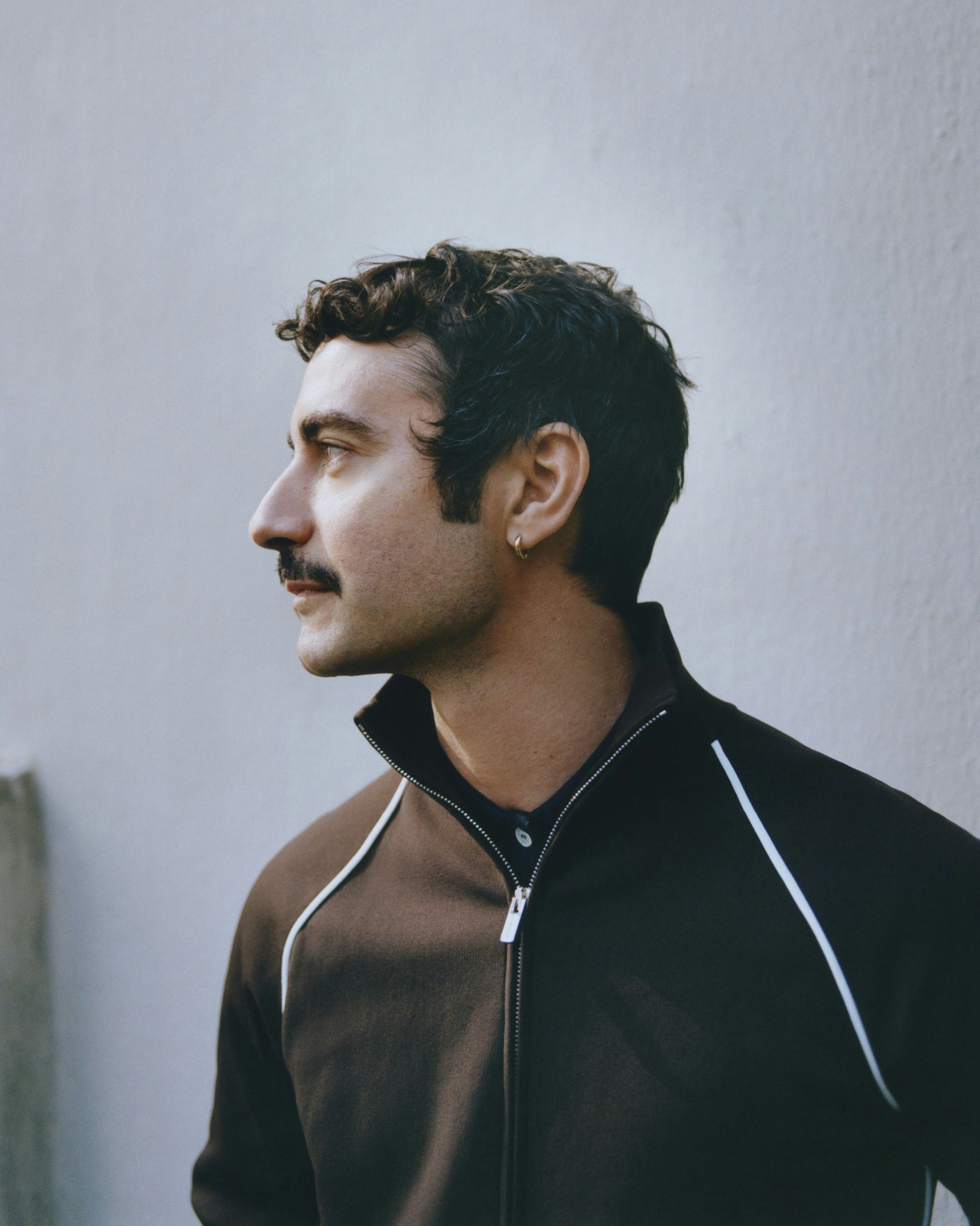 Dario Vitale leaves versace