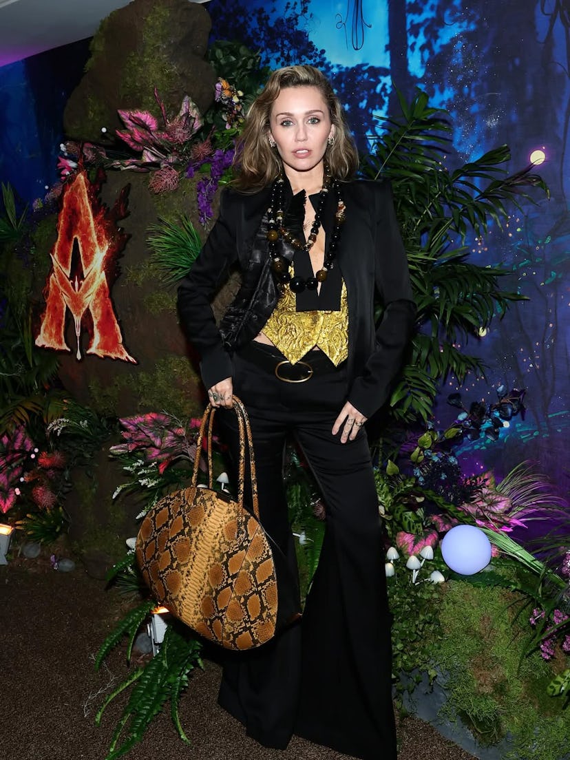 Miley Cyrus Styles Her Engagement Ring With Extra-Large Python Bag