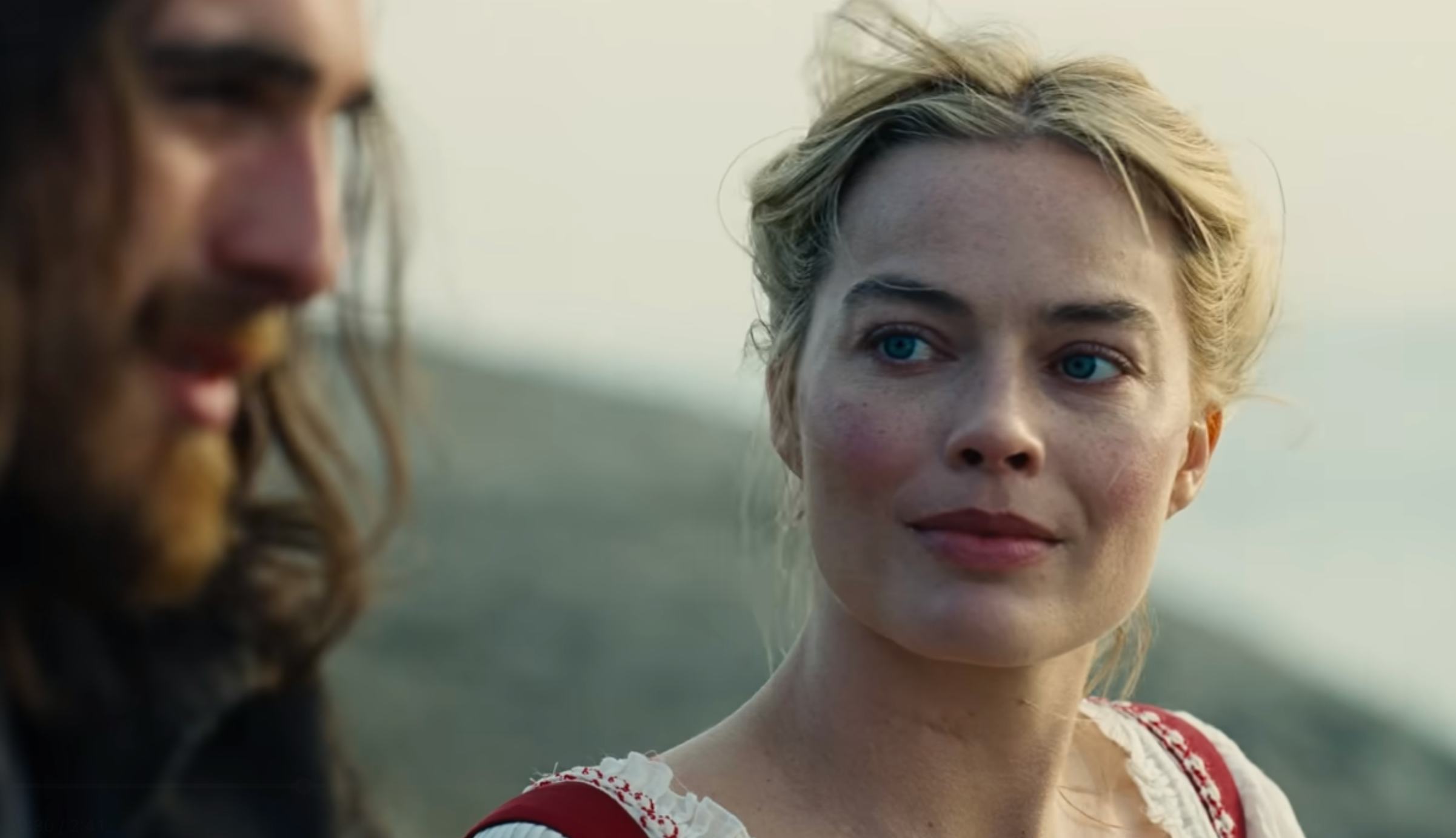 Jacob Elordi and Margot Robbie in Wuthering Heights. Screenshot via Warner Bros. YouTube