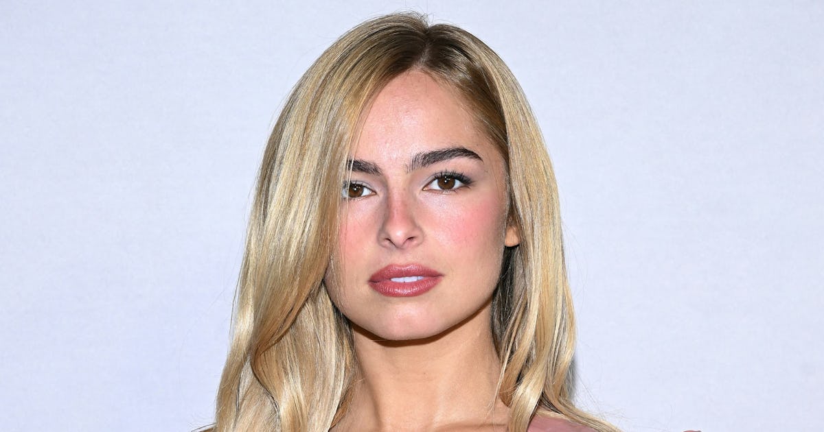 Addison Rae Is a Latex Trad Wife in Plunging Corset Dress