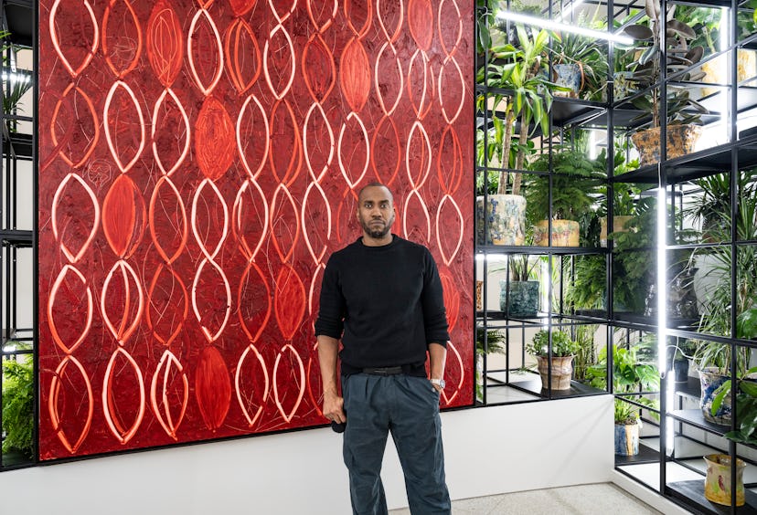 Rashid Johnson pictured with his installation, "A Poem for Deep Thinkers" and the Guggenheim Museum,...