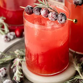 fizzy cranberry ginger beer cocktail, in a story about easy holiday mocktails