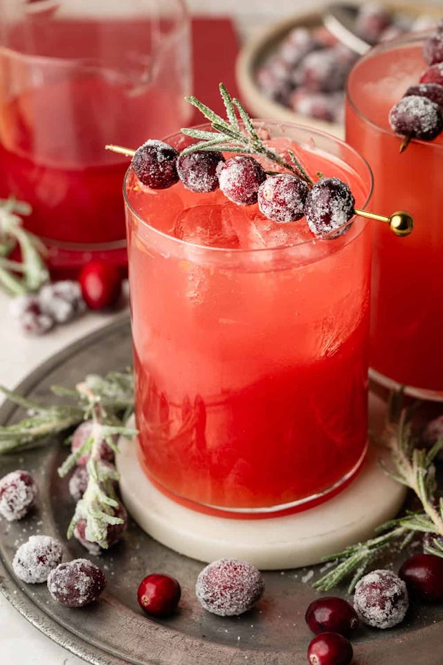 fizzy cranberry ginger beer cocktail, in a story about easy holiday mocktails