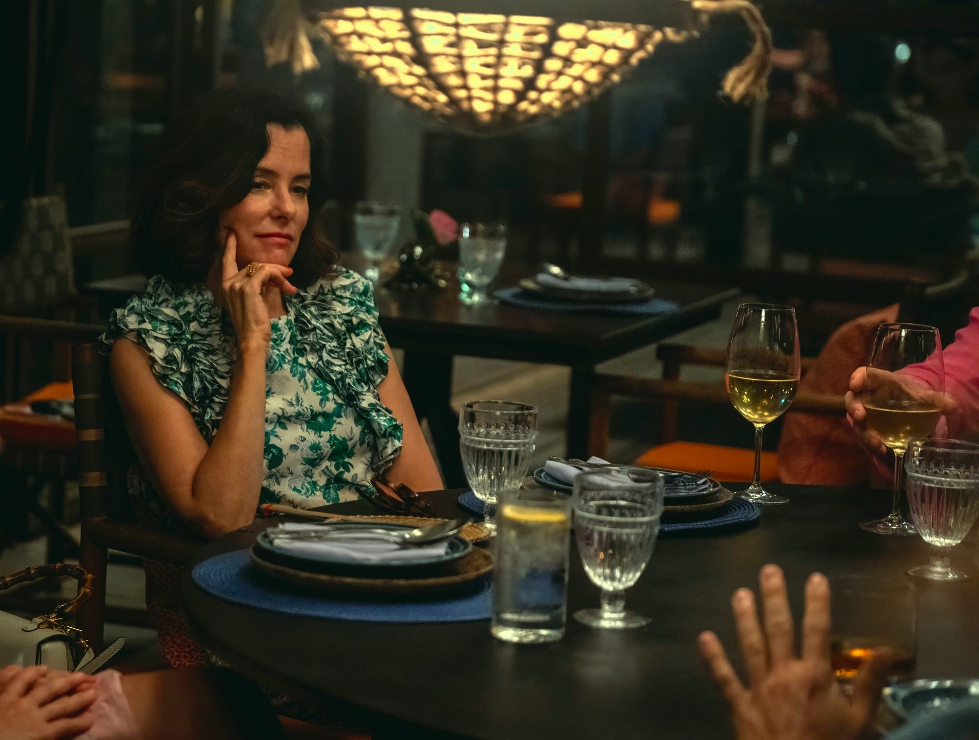 Parker Posey as Victoria seated at a restaurant table at a Thailand resort in &lsquo;The White Lotus&rsquo; Seas&hellip;