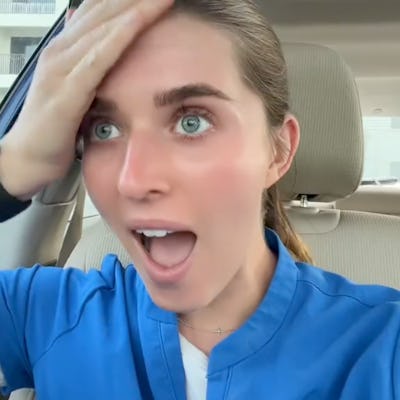 A surprised young woman in a blue medical scrub looks shocked while sitting in a car, touching her forehead, with a caption about "OBGYN ROTATION" above her.