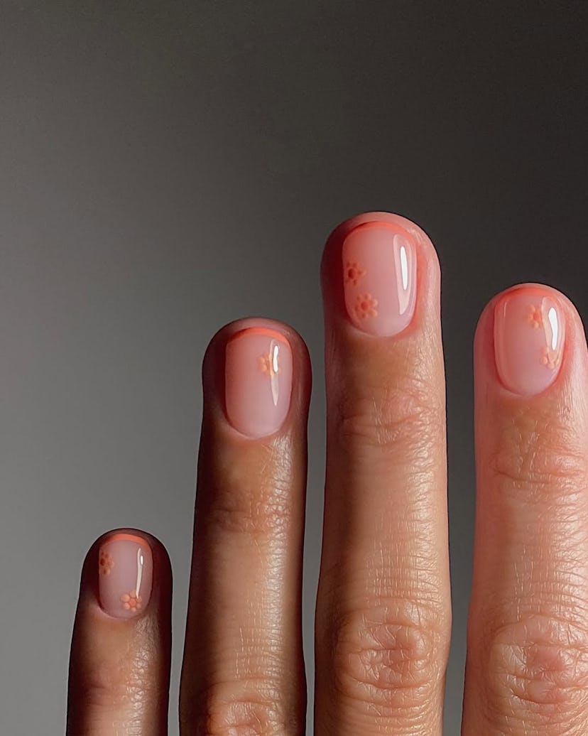 Photo of micro-French manicure with orange tips