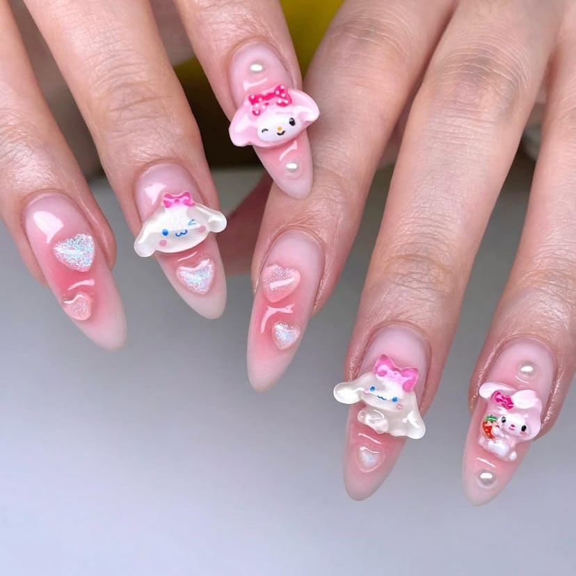 Photo of pink manicure with 3D nails