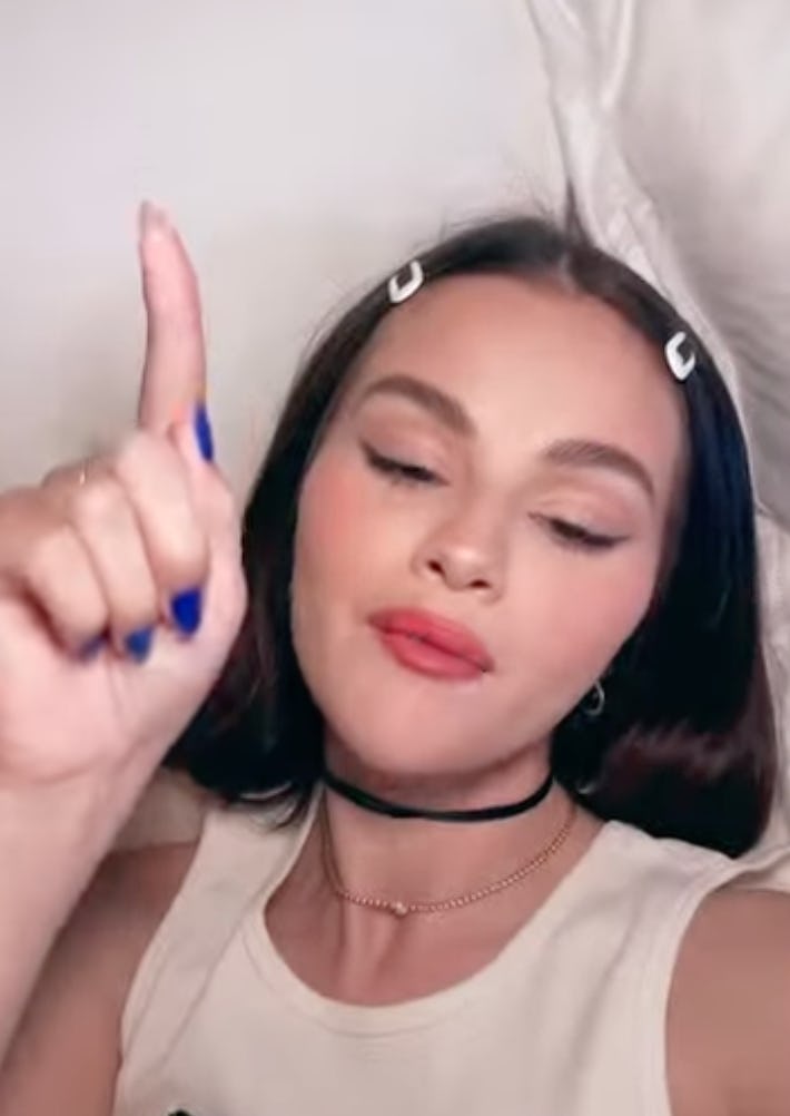 Selena Gomez with navy blue nails.