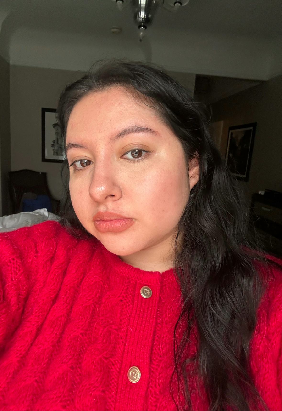 Daisy Maldonado wearing the Well People Daygleamer Mineral Sunscreen Serum SPF 34.