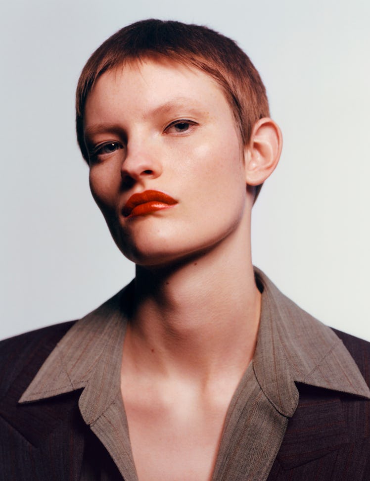 Lauren Theobald wears a Bottega Veneta jacket and shirt.
