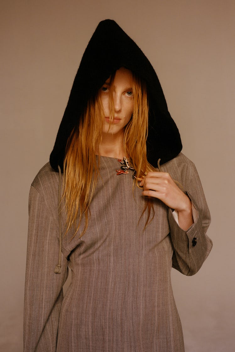 Rianne Van Rompaey wears a Bottega Veneta dress; stylist’s own hood (throughout).
