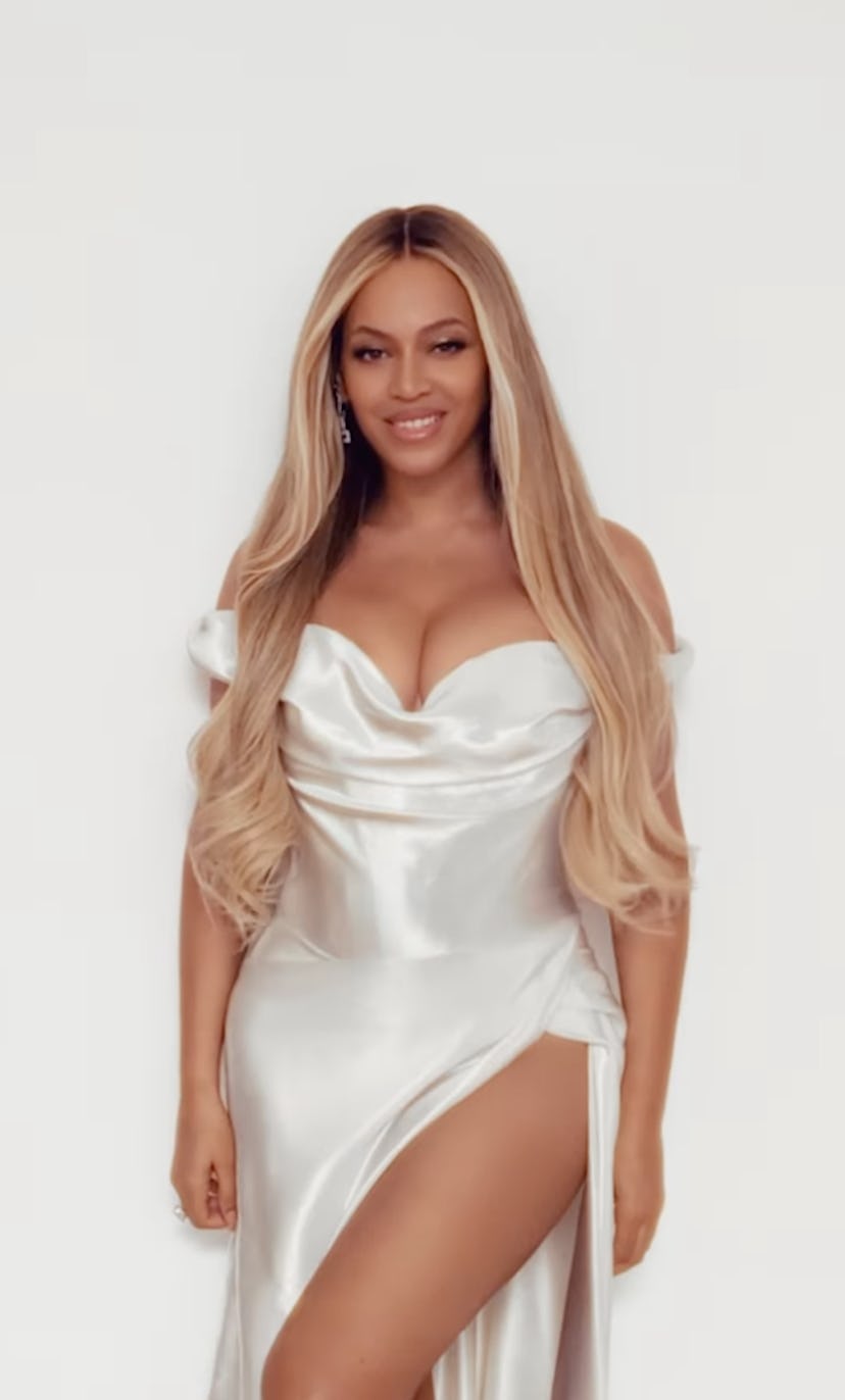 Beyoncé wore a cleavage-baring dress with a slit for Cécred.