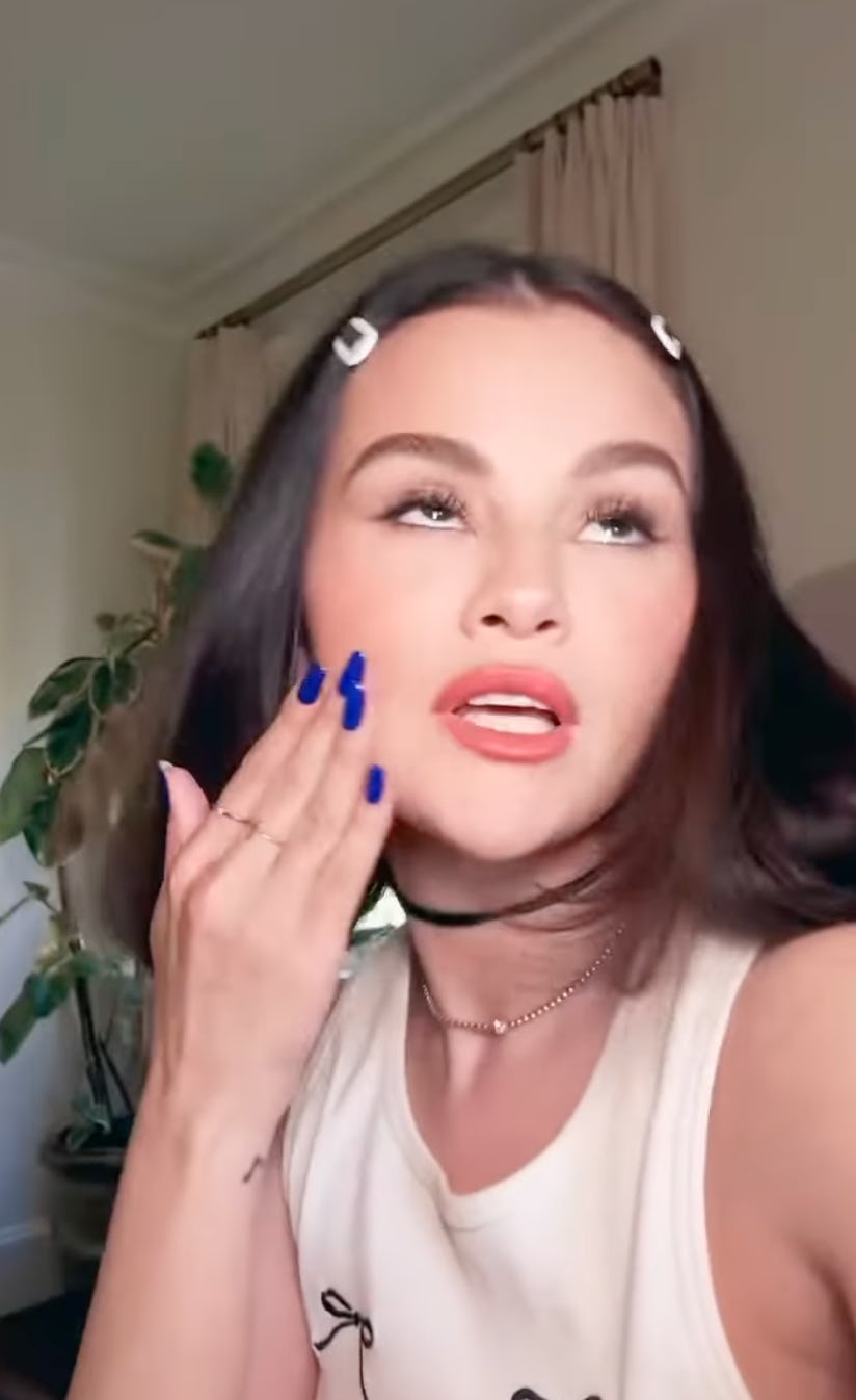 Photo of Selena Gomez wearing a royal blue manicure