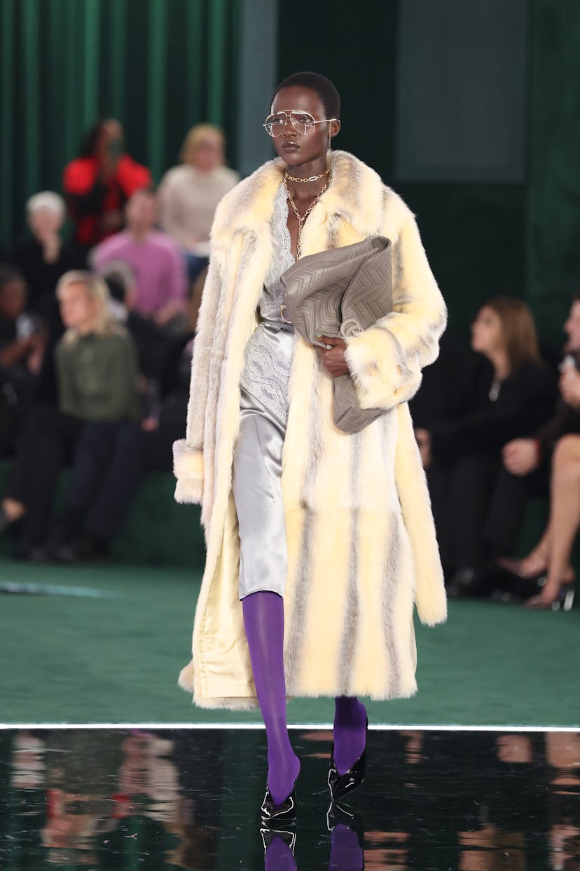 A Gucci models walks the runway at their Fall 2025 show