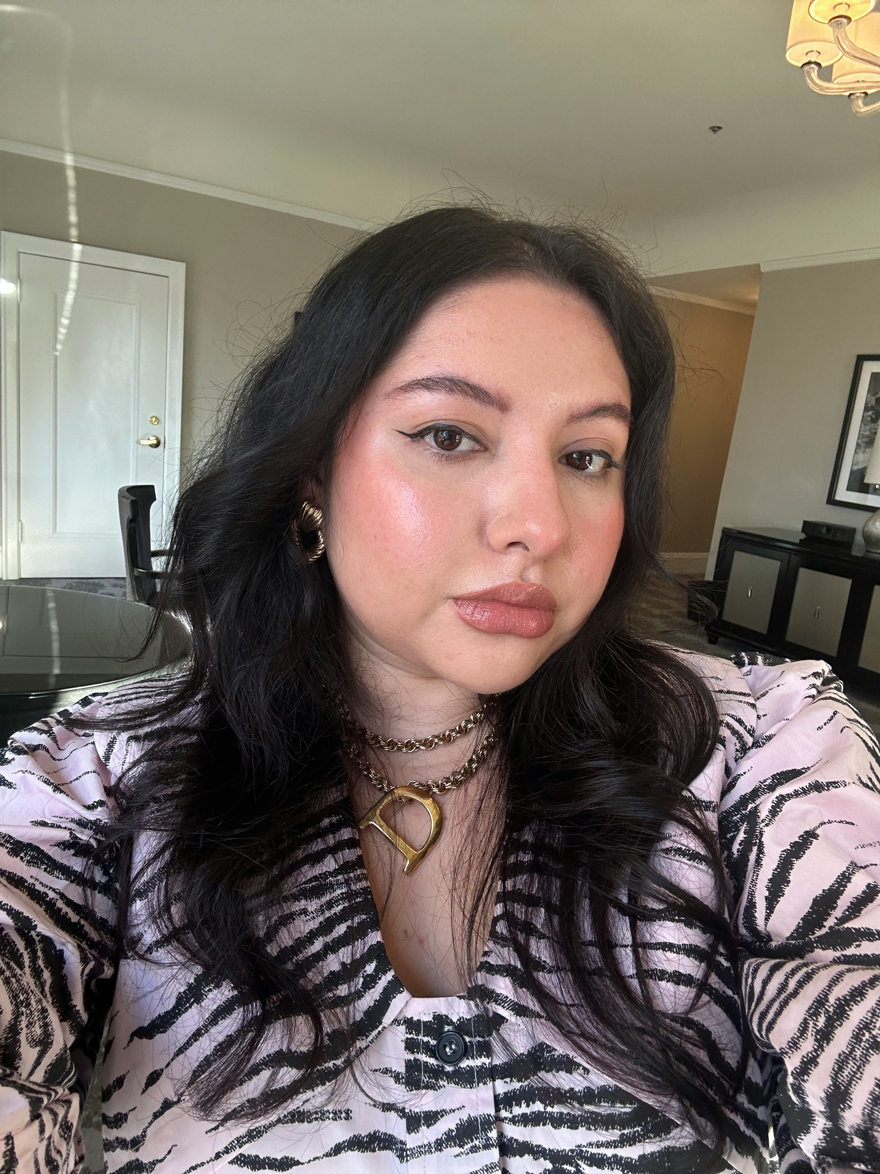 Daisy Maldonado using Saie&rsquo;s new SuperSuede Powder Blush