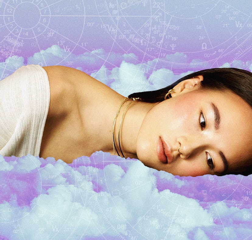 Young woman laying down, sulking after reading her March 2025 horoscope.