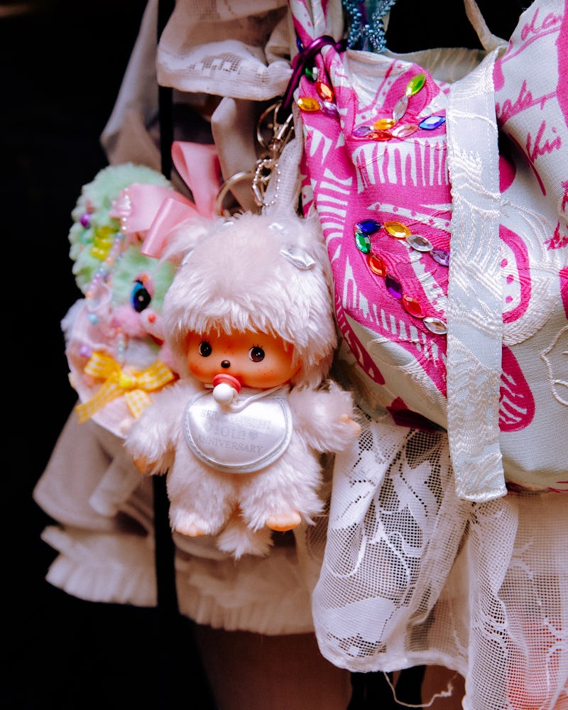 A close-up of cutesy bag charms, worn to the magical girl party.