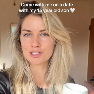 A woman with long, blonde hair smiles while holding a mug, inviting viewers to join her on a date with her 13-year-old son.