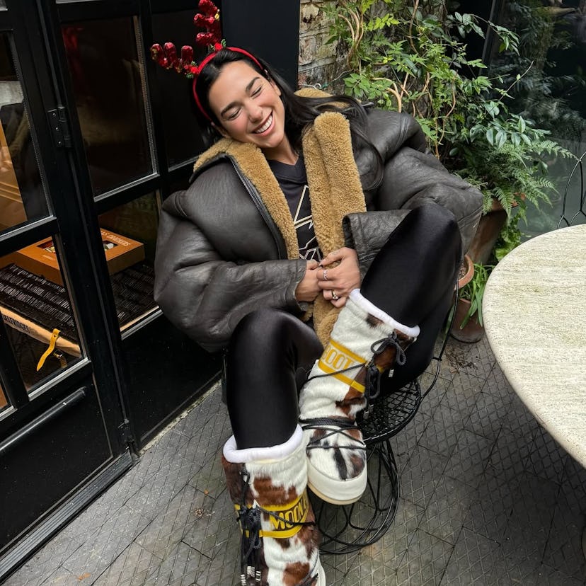 Dua Lipa wearing Moon Boots