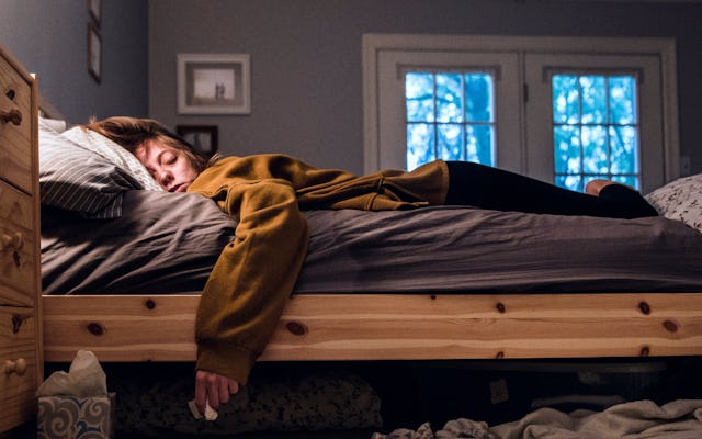 A woman suffers from the flu.