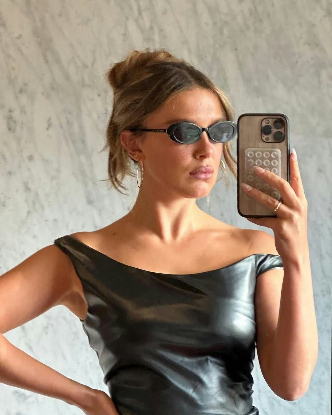Millie Bobby Brown's Y2K-style blonde hair is so Britney Spears-coded.