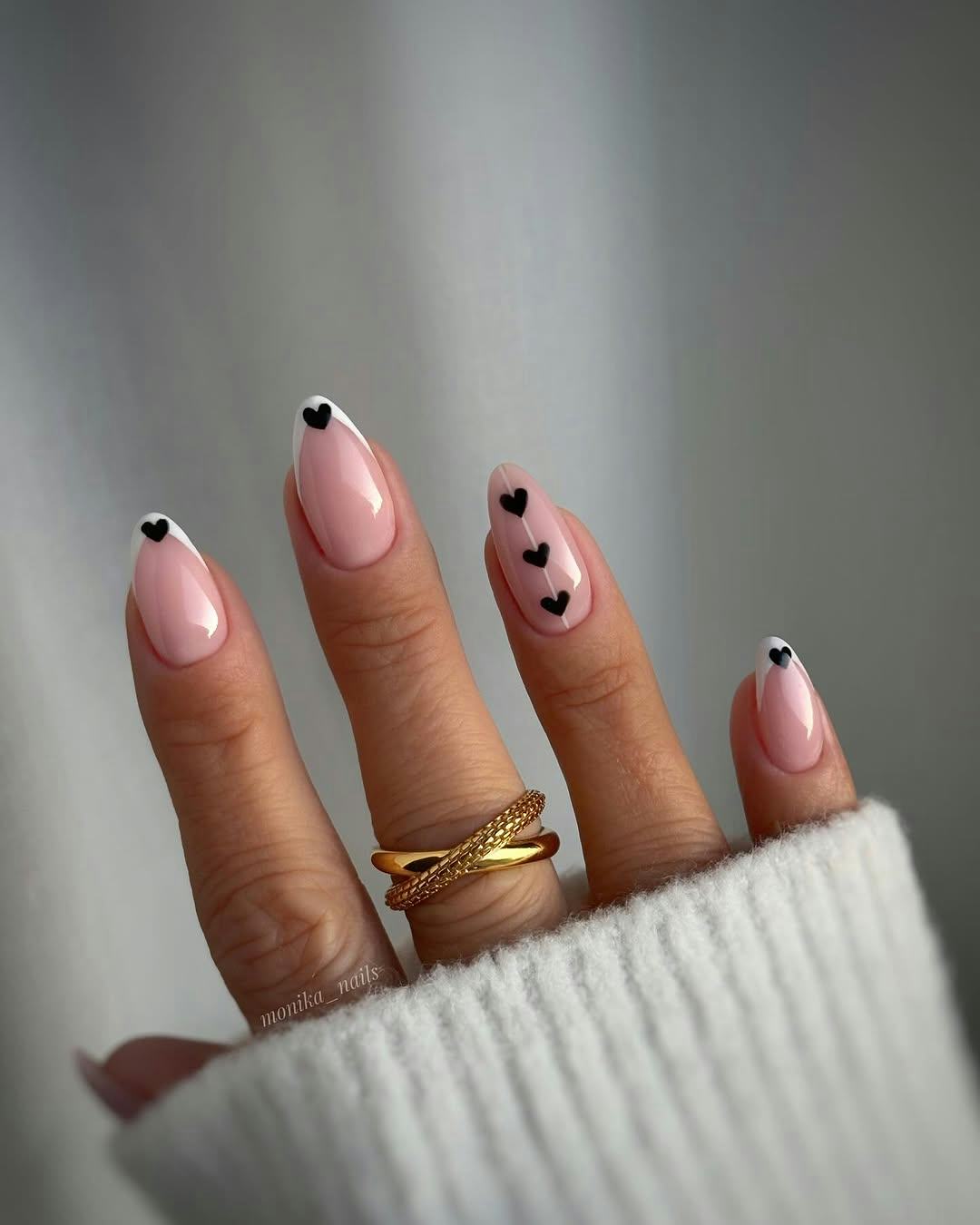 black and white micro-French manicure with heart nail art