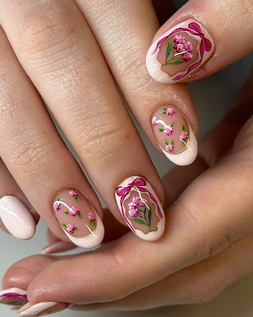short oval-shaped floral french manicure
