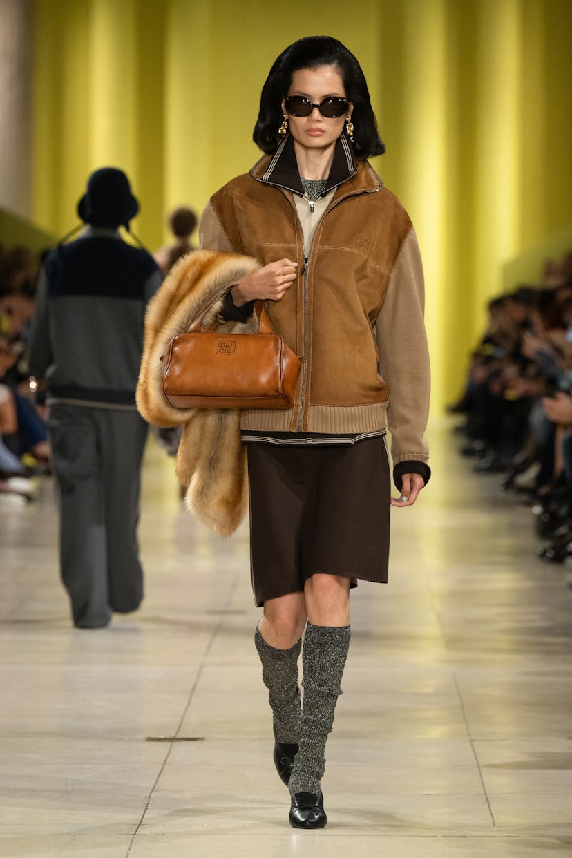 A model on the runway at the Miu Miu Fall RTW 2025 fashion show as part of Paris Fashion Week held a...