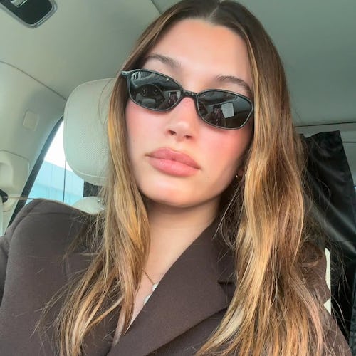 Hailey Bieber’s glazed pink nails are perfect for spring.