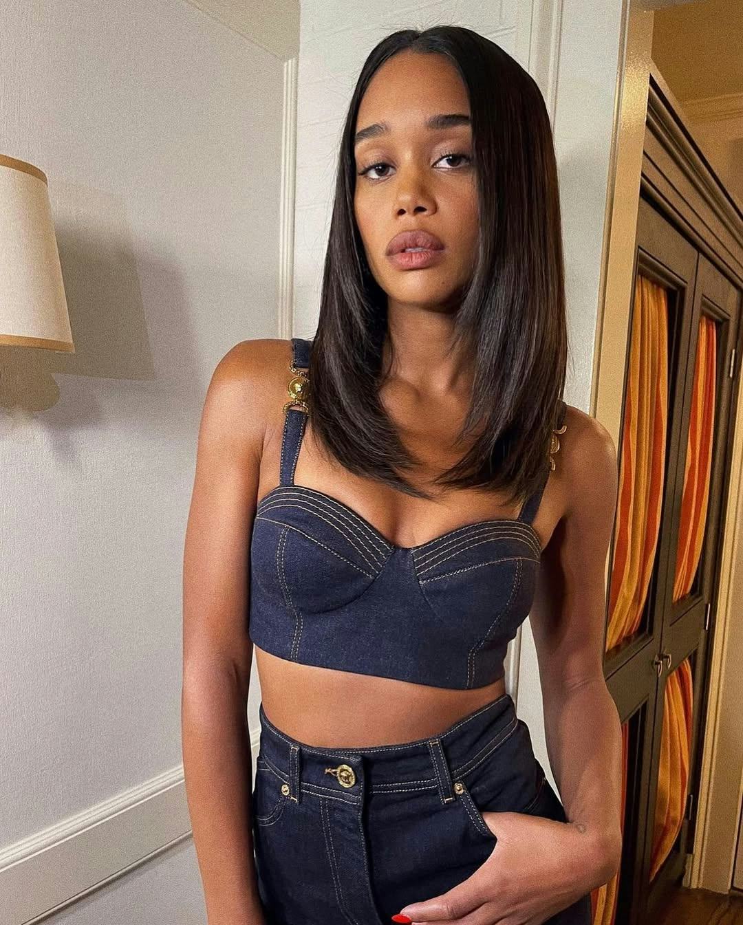 Laura Harrier with a c-cut hairstyle.