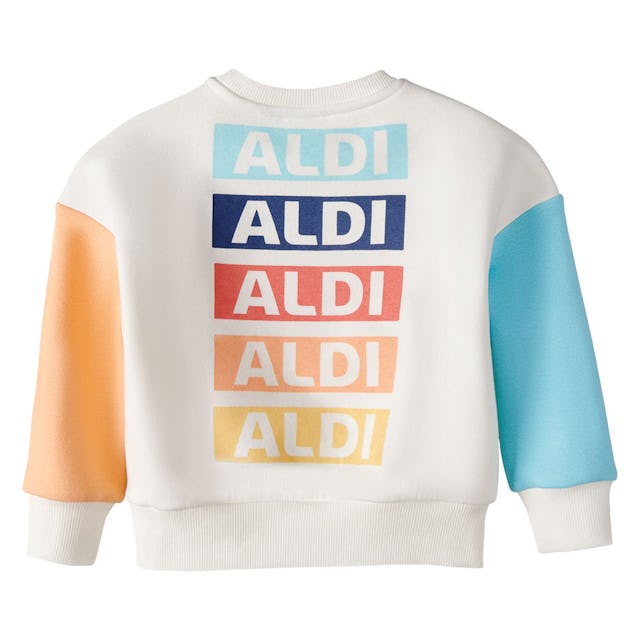 A white sweatshirt featuring a colorful striped design on the back with multiple "ALDI" logos in blu...