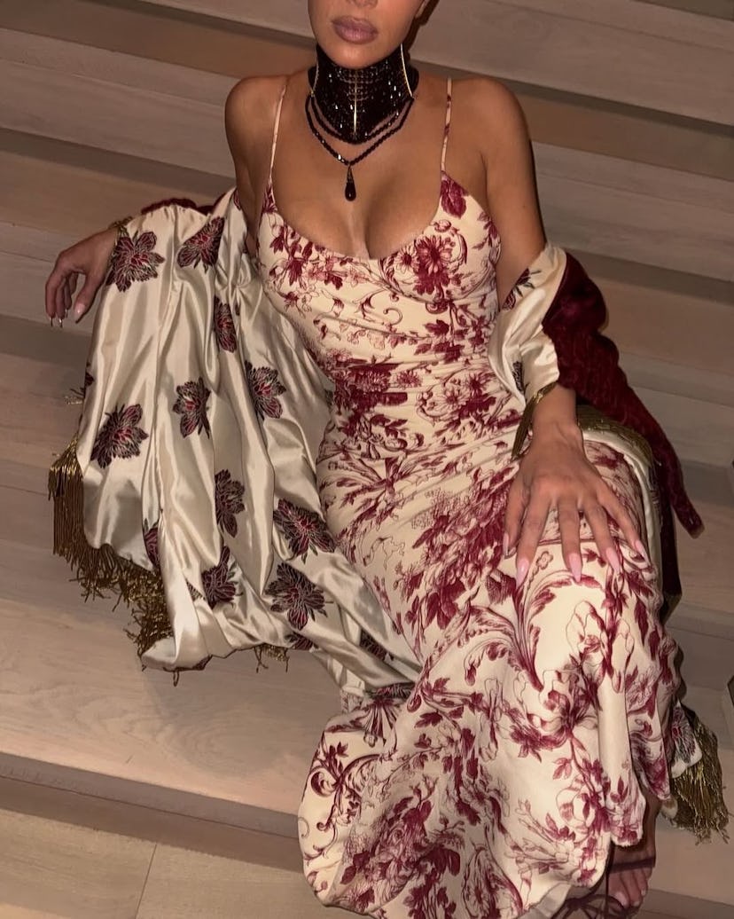 Kim Kardashian wears a floral slip dress from Dior’s Spring/Summer 1998 collection.