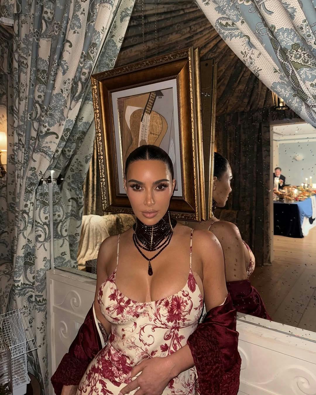 Kim Kardashian wears a floral slip dress from Dior&rsquo;s Spring/Summer 1998 collection.
