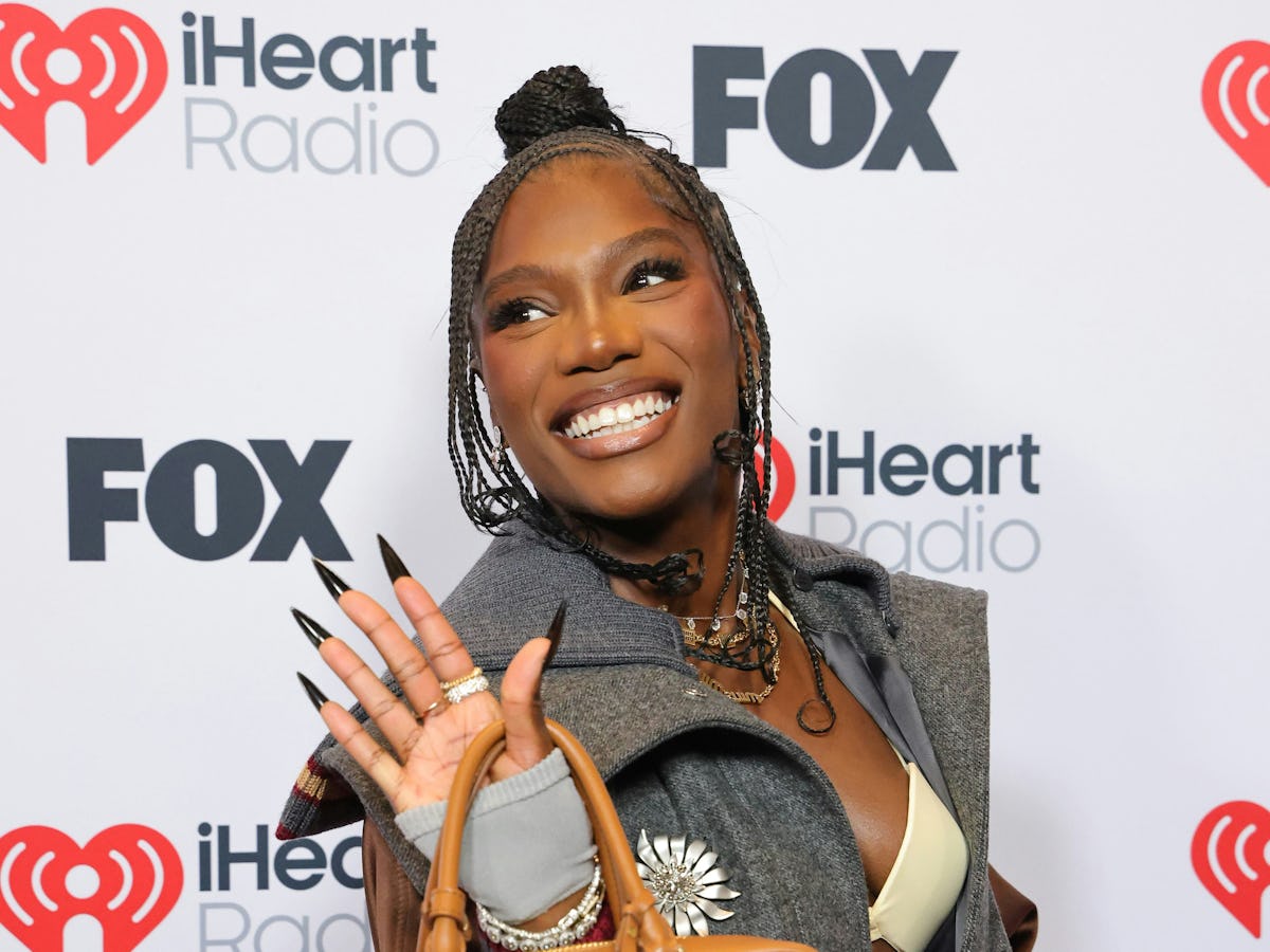 Doechii Doubles the Bag Charm Trend in a Schoolgirl Bra and Leg Doechii Doubles the Bag Charm Trend in a Schoolgirl Bra and Leg