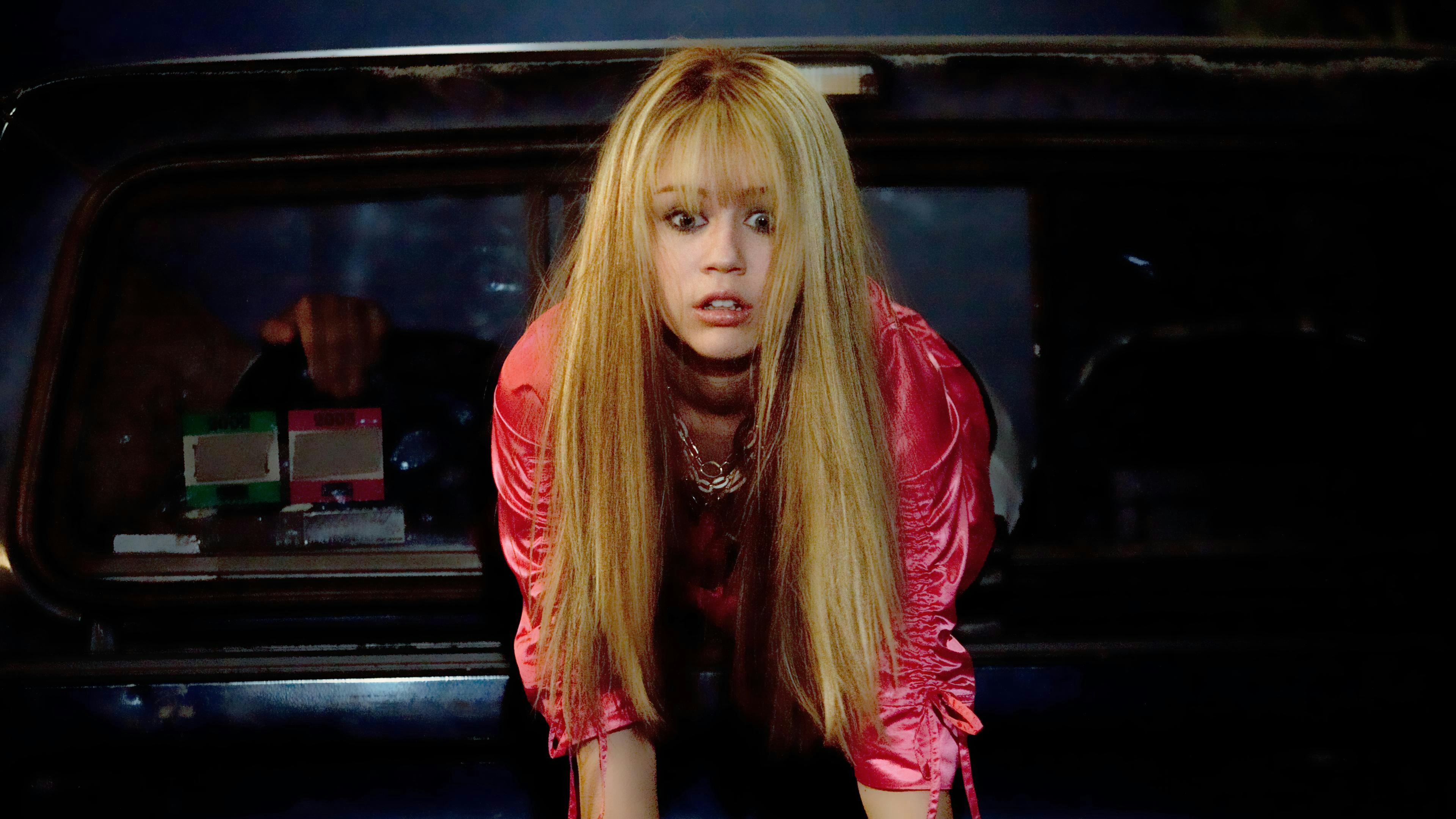 Miley Cyrus as Hannah Montana