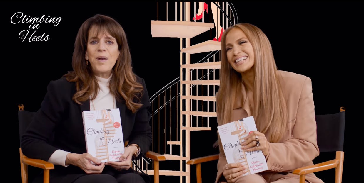 J.Lo wore a plunging suit to promote her bestie&rsquo;s upcoming book.