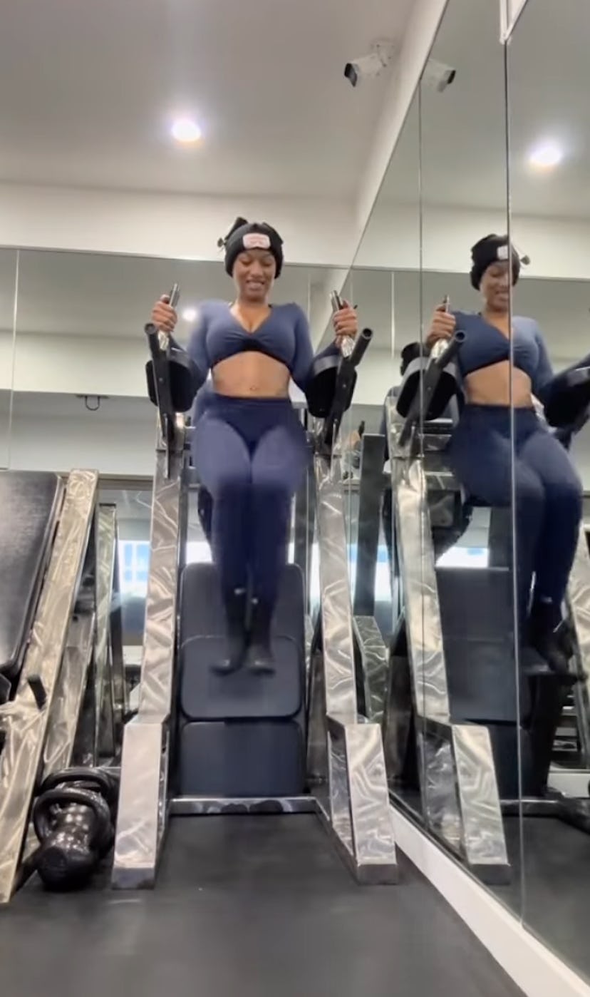 Megan Thee Stallion’s “Megchella” workout ‘fits include plunging, navel-baring tops.