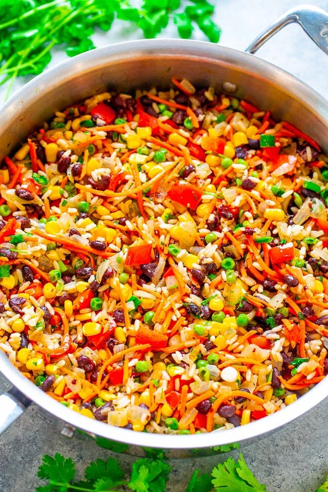 Veggie loaded rice and beans, a high fiber side dish recipe.