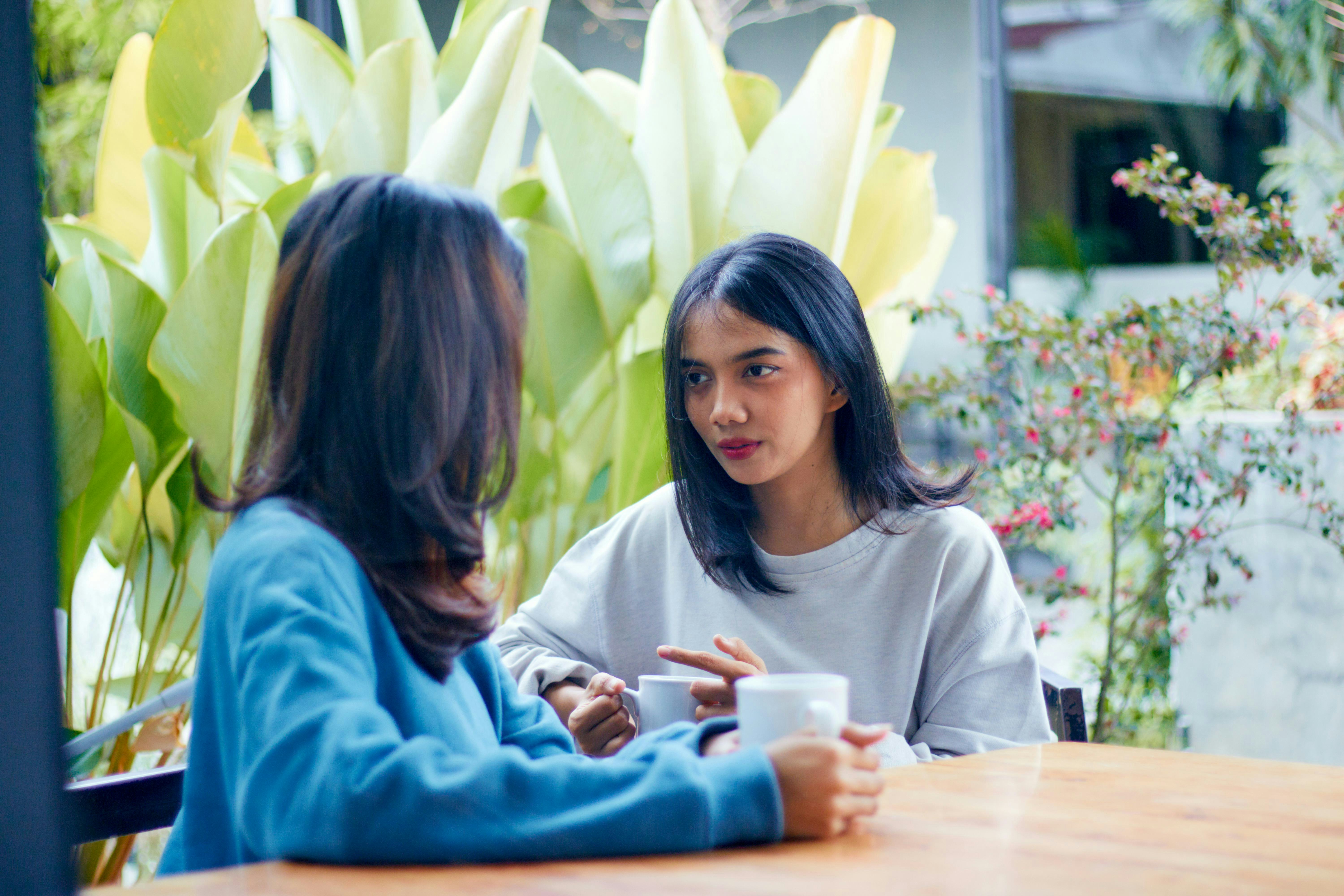 Women having a thoughtful discussion