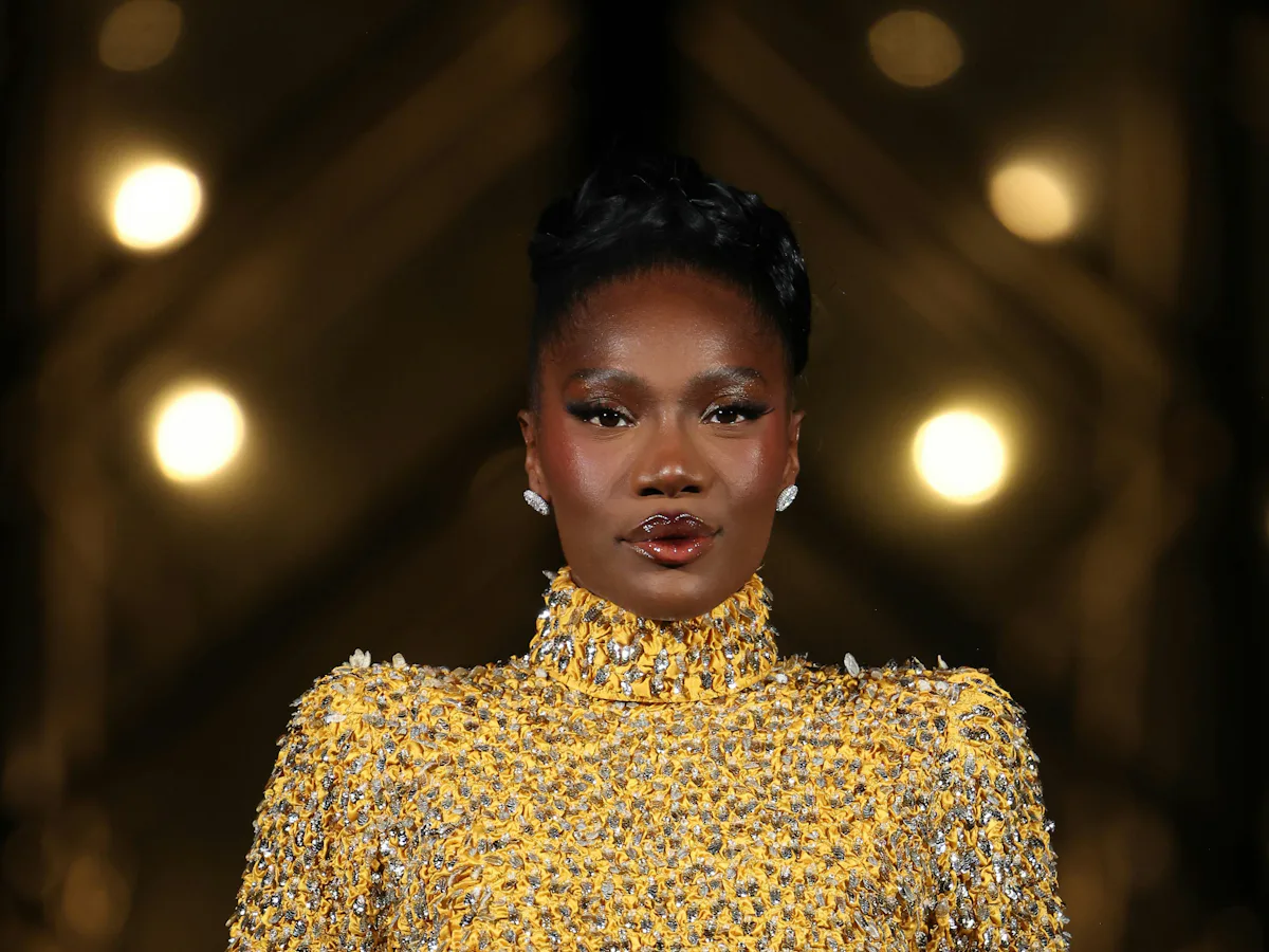 doechii paris fashion week dress Doechii glows in gold Valentino dress at Louvre fashion dinner