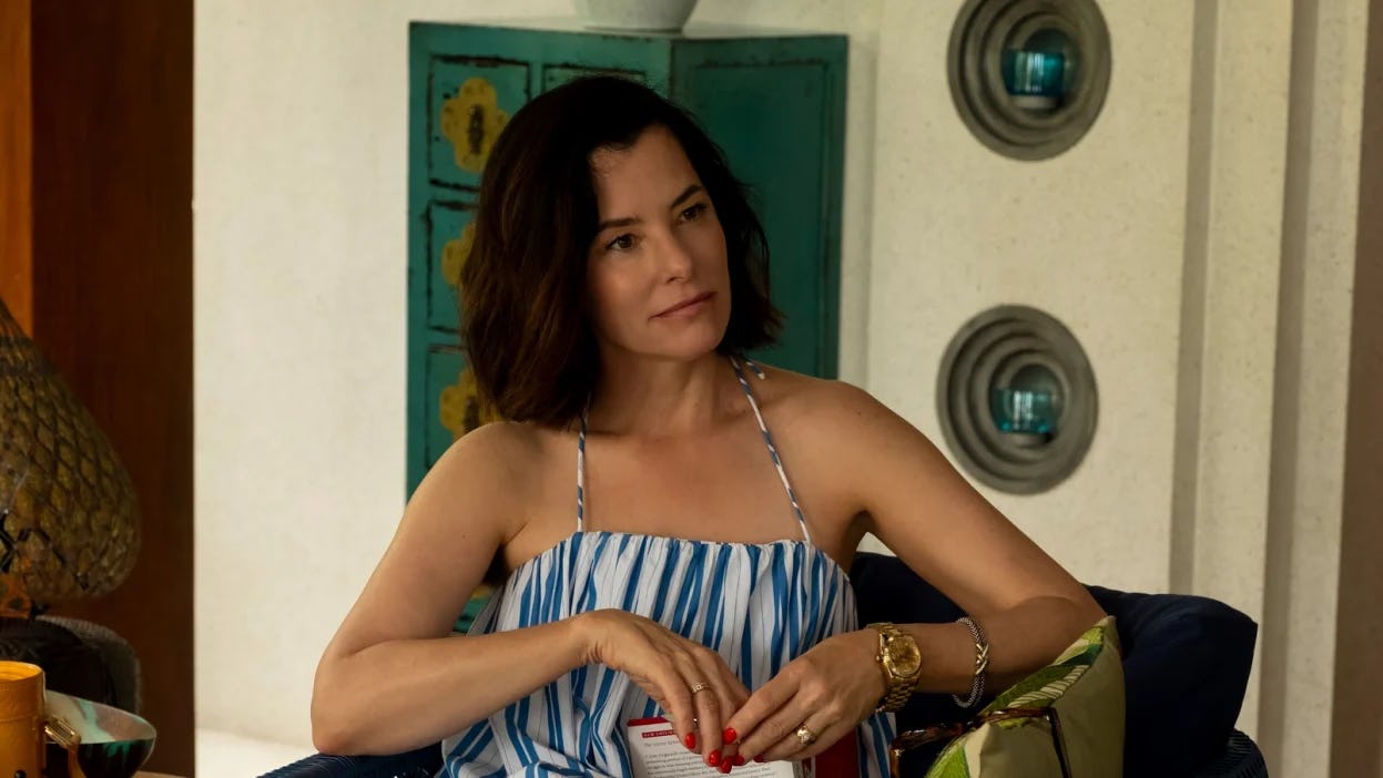 Parker Posey as Victoria Ratliff on &lsquo;The White Lotus&rsquo; Season 3, wearing an expensive watch.